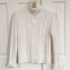Knit sweater.